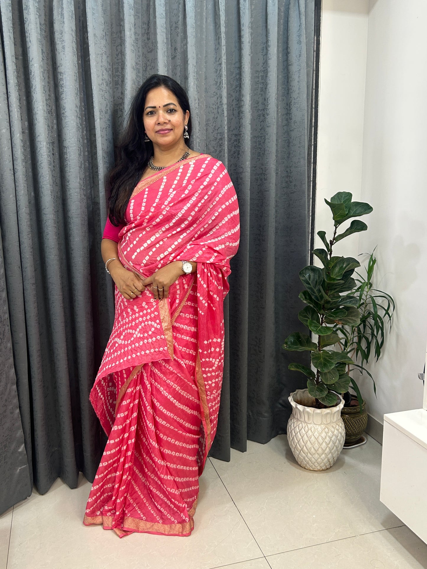 Pink Bandhani Saree with Lehariya pattern and Zari Border SB192