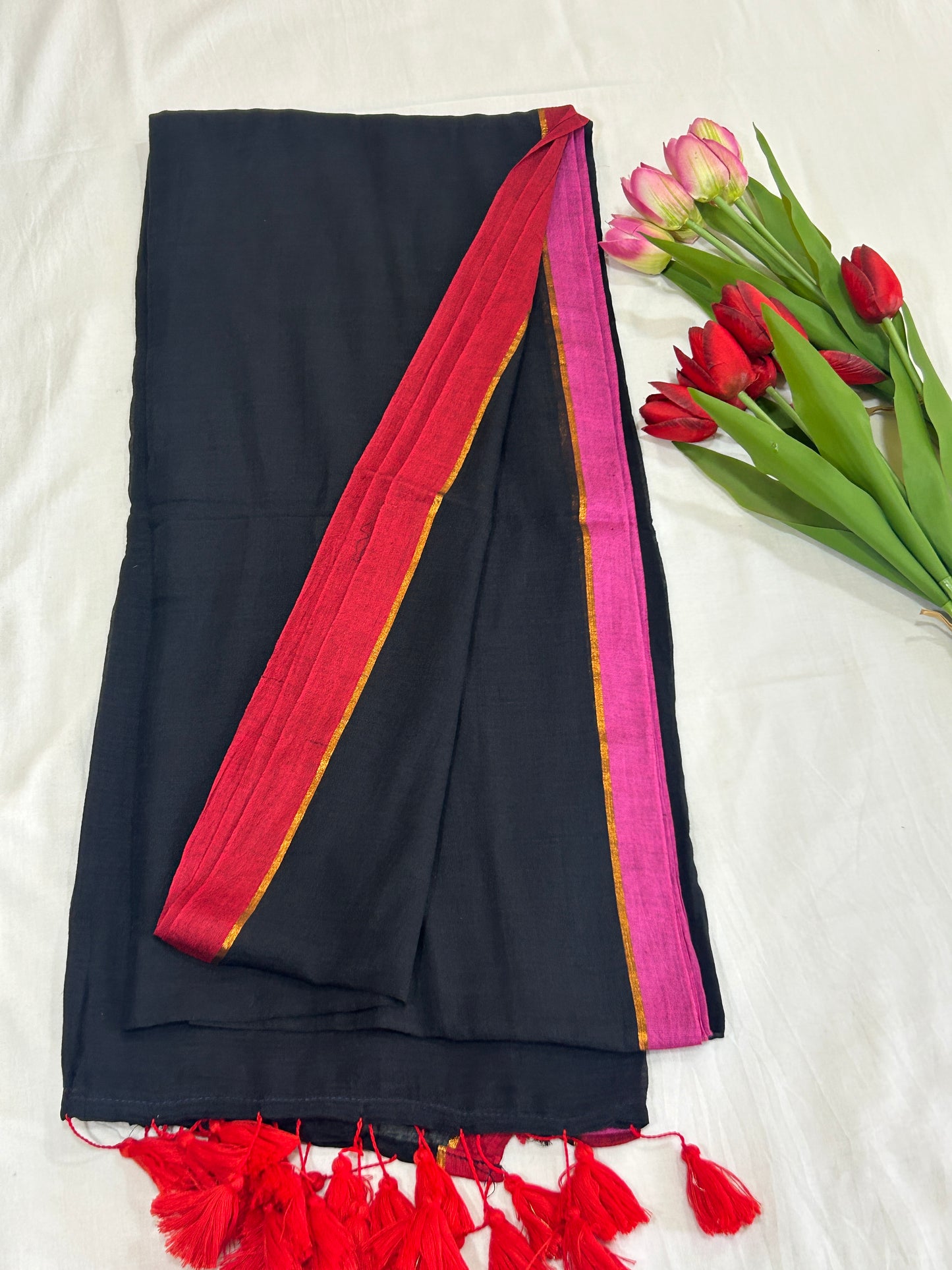 Black Mulcotton saree with red and pink border with golden stripe SMC237