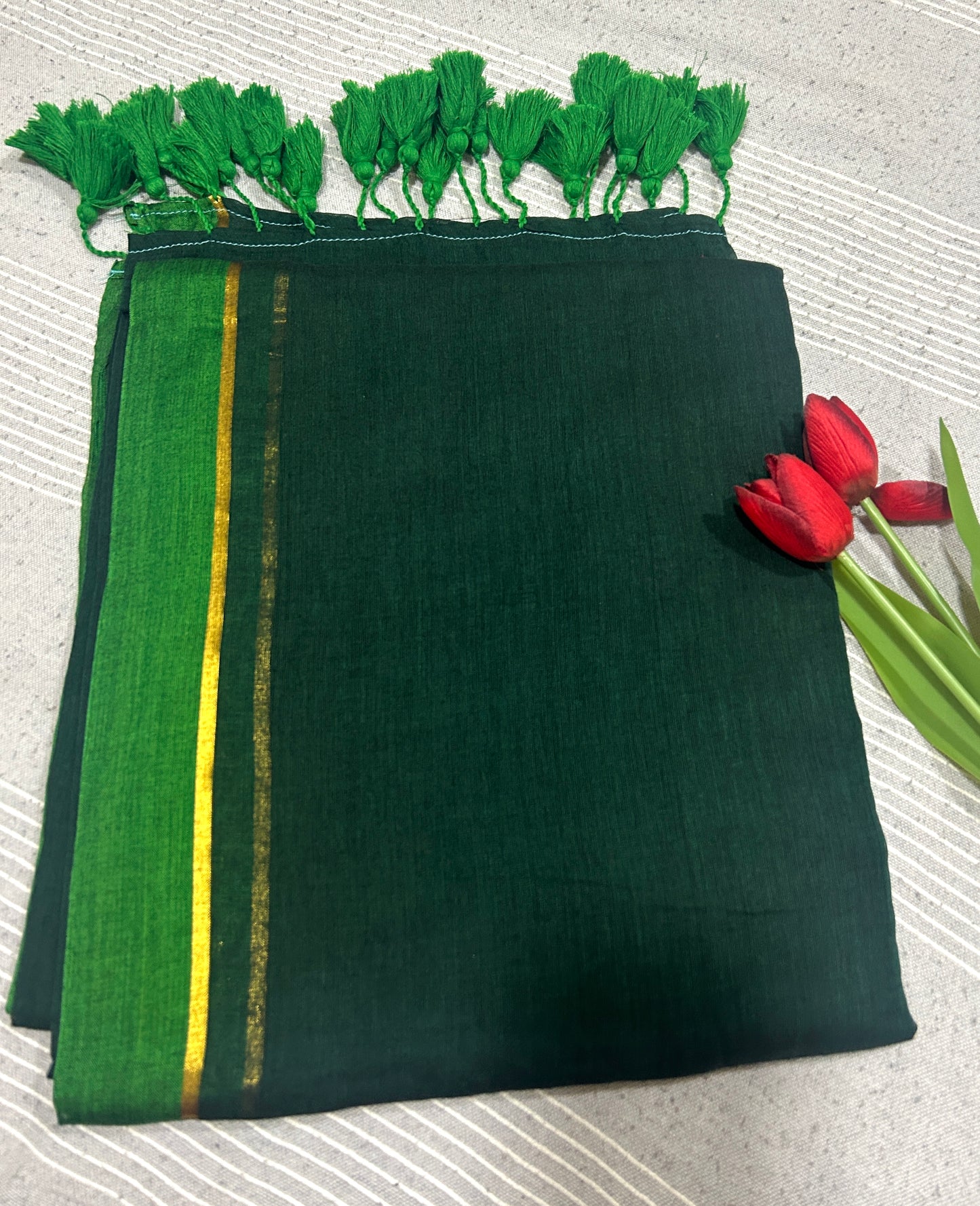 Dark Green Mulcotton saree with light green and golden stripe SMC248