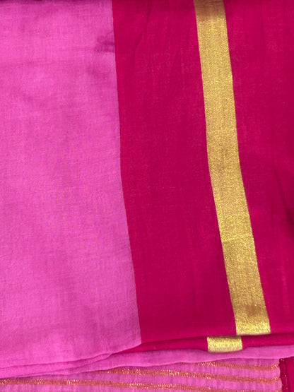 Light Pink mulcotton saree with dark pink with golden stripe border an tassels SMC236