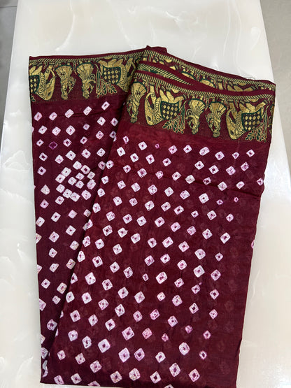 Maroon color Bandini saree with woven figure motifs all over the borders with plain blouse  piece SB207