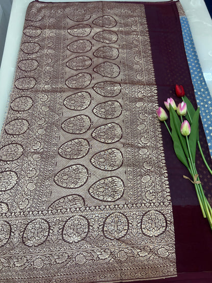 Powder blue Handloom Khaddi Georgette Banarasi Saree with contrast brown blouse
