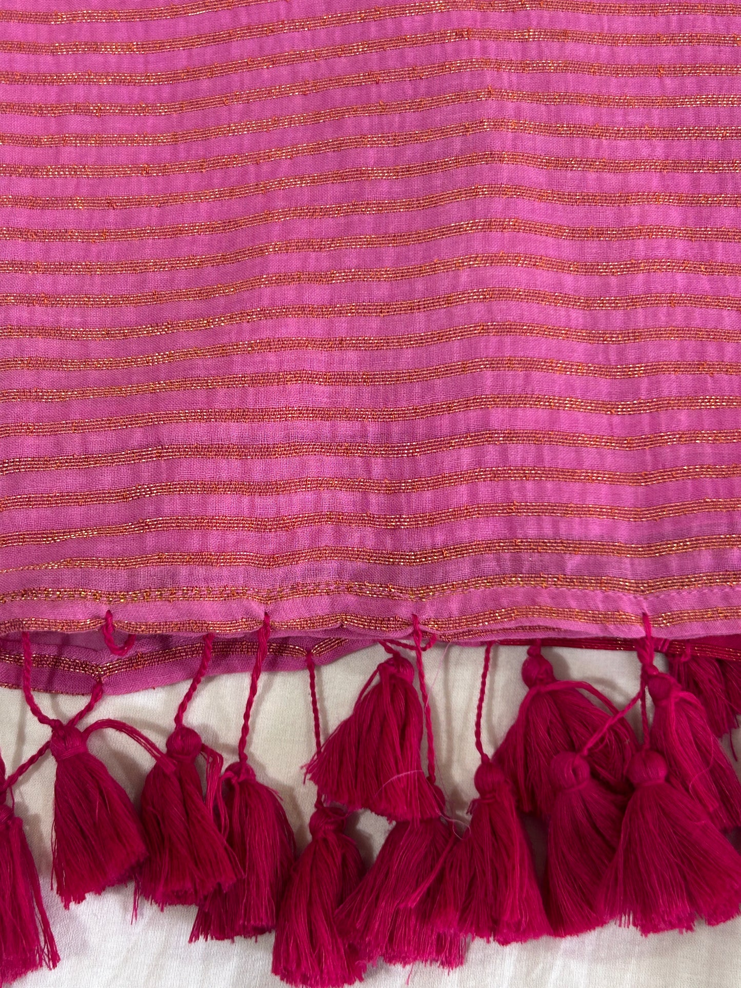 Light Pink mulcotton saree with dark pink with golden stripe border an tassels SMC236