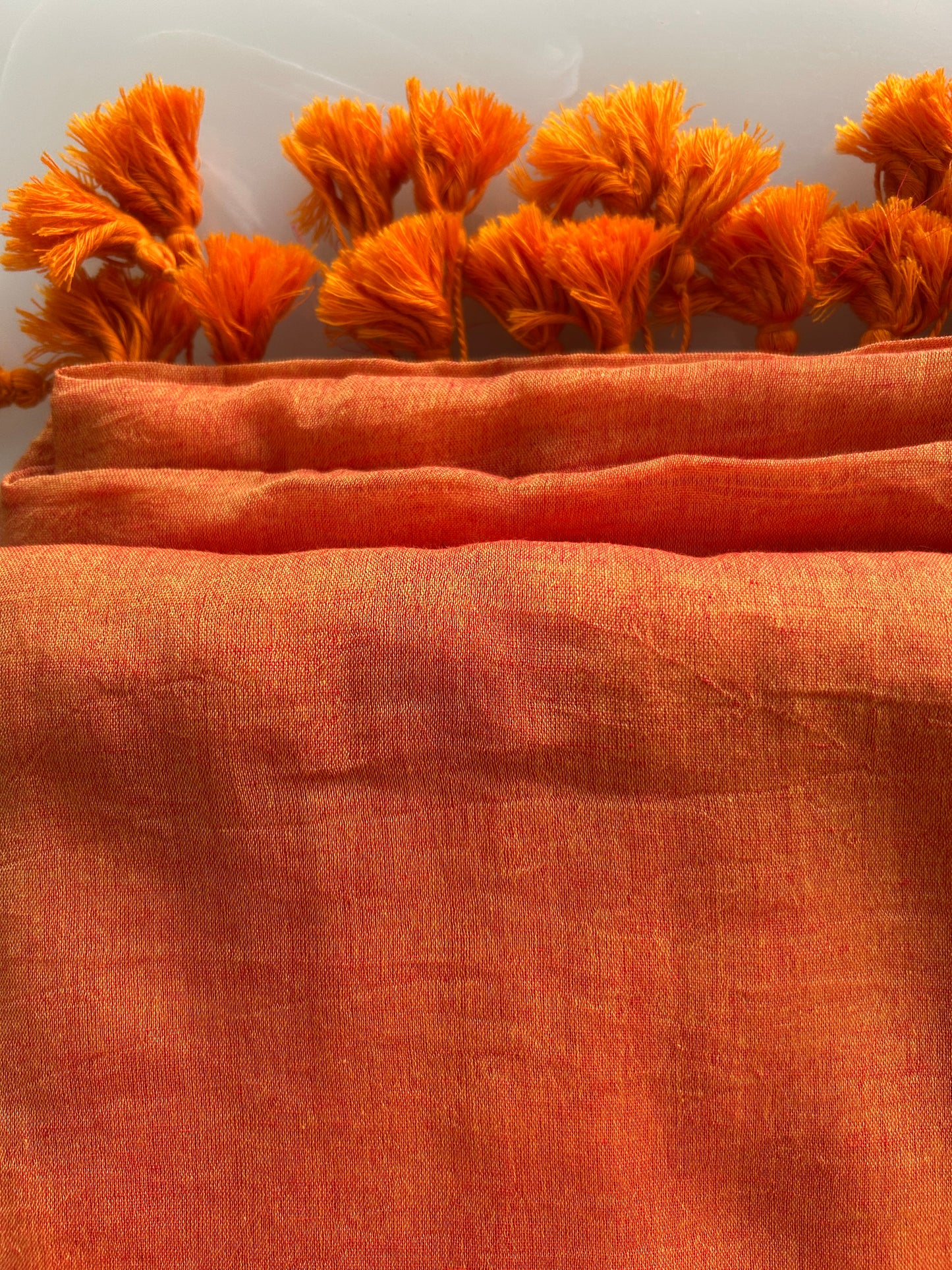 Orange color plain Mulcotton saree (No blouse piece)