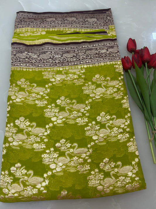 Parrot Green Handloom Khaddi Georgette Banarasi Saree with contrast brown blouse