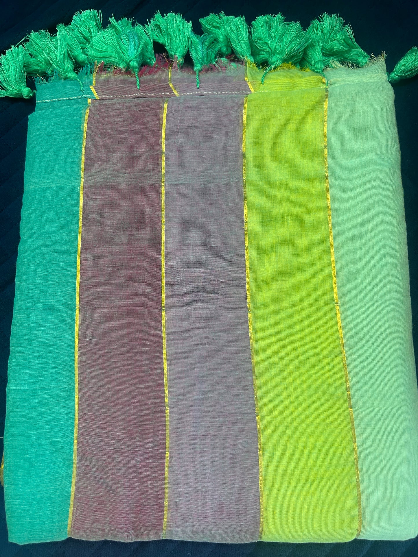 Rainbow mulcotton with light blue and purple stripes all over the body