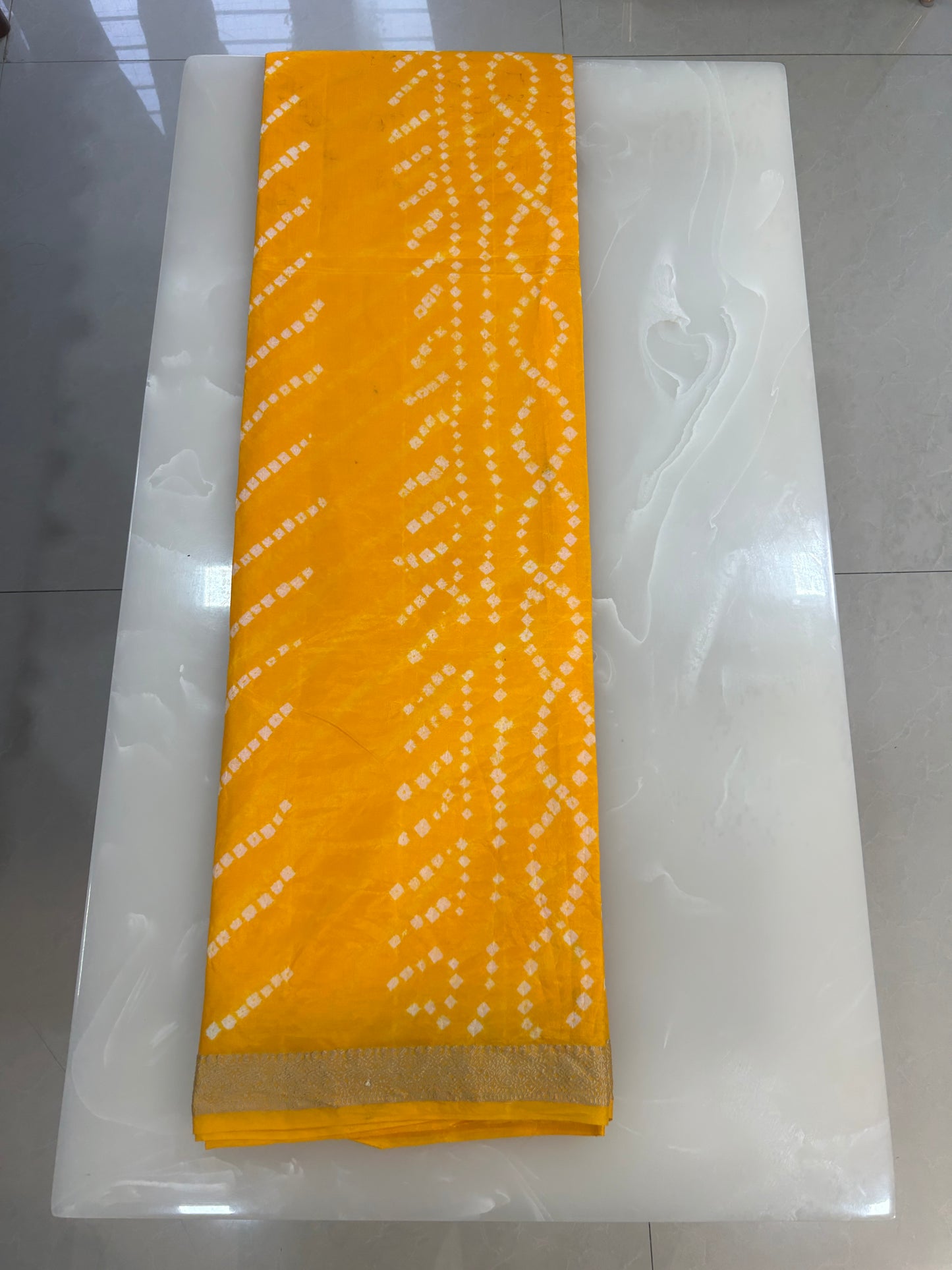 Mango yellow  Bandhani Saree with Lehariya pattern and  Zari Border SB190
