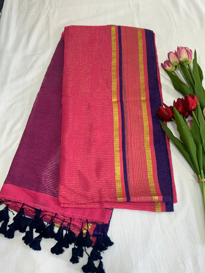 Pink color mulcotton saree with golden lines all over the body and blue and golden striped border SMC235