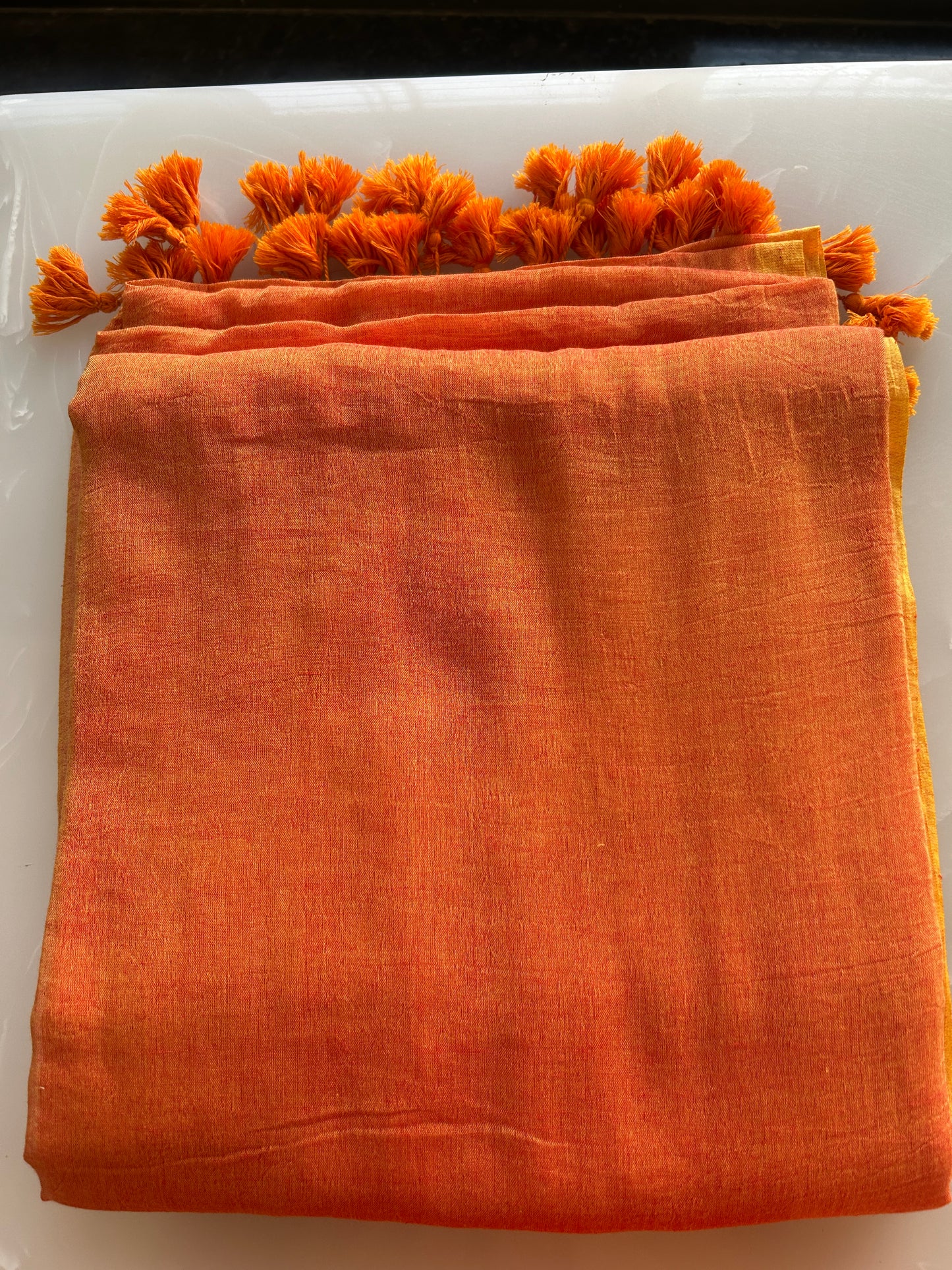 Orange color plain Mulcotton saree (No blouse piece)
