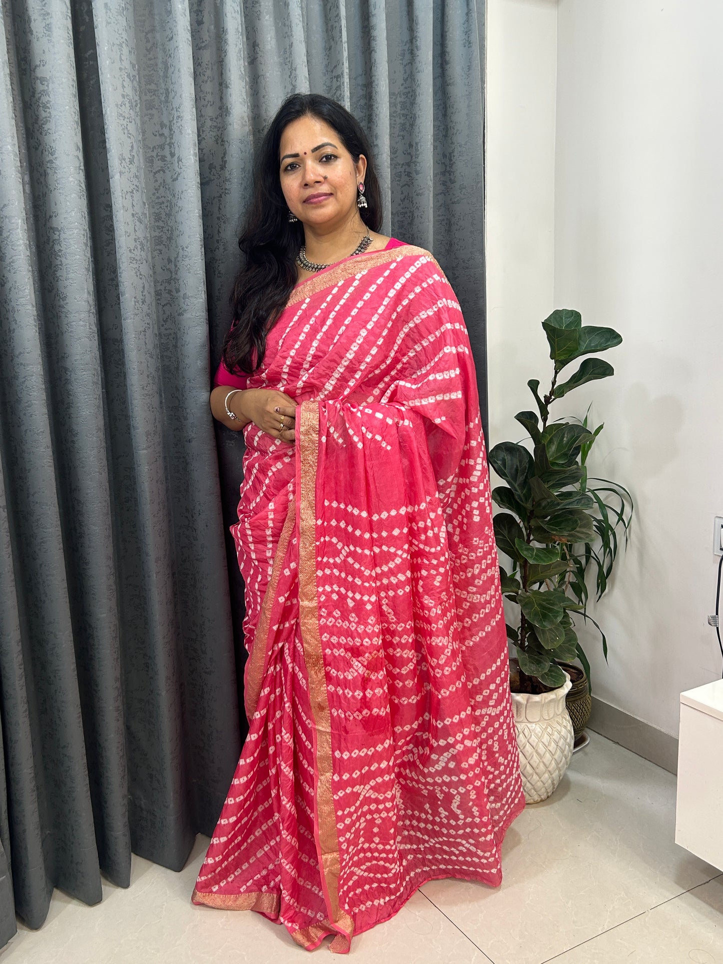 Pink Bandhani Saree with Lehariya pattern and  Zari Border SB192
