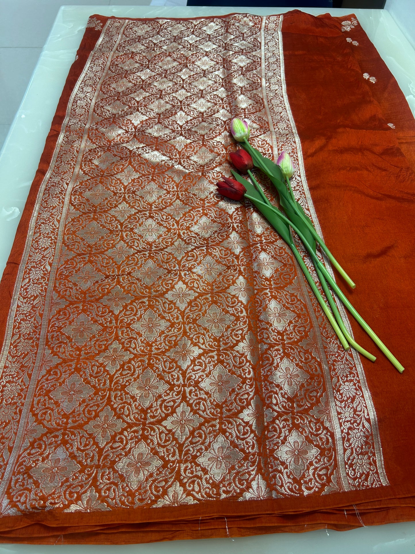 Rust Orange color boarderless  Dupion Silk Handloom Banarasi Saree