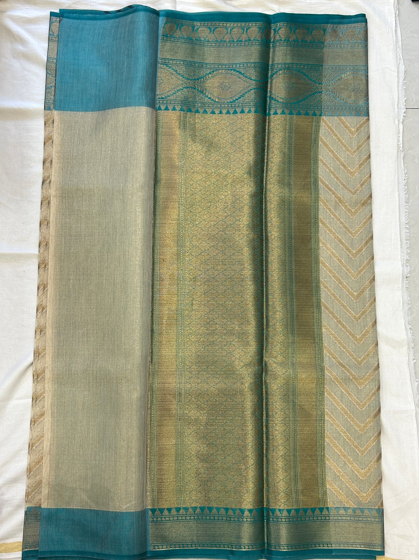 Champagne Gold with Teal Blue border with Antique Gold Zari Linen Tissue Banarasi saree with Brocade blouse piece
