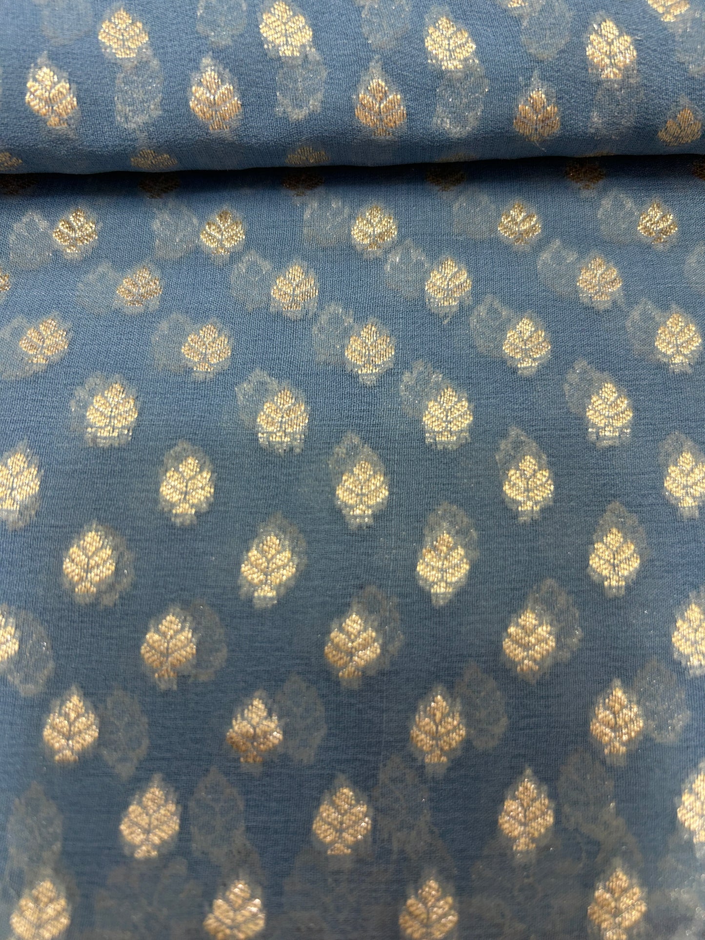 Powder blue Handloom Khaddi Georgette Banarasi Saree with contrast brown blouse