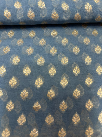 Powder blue Handloom Khaddi Georgette Banarasi Saree with contrast brown blouse
