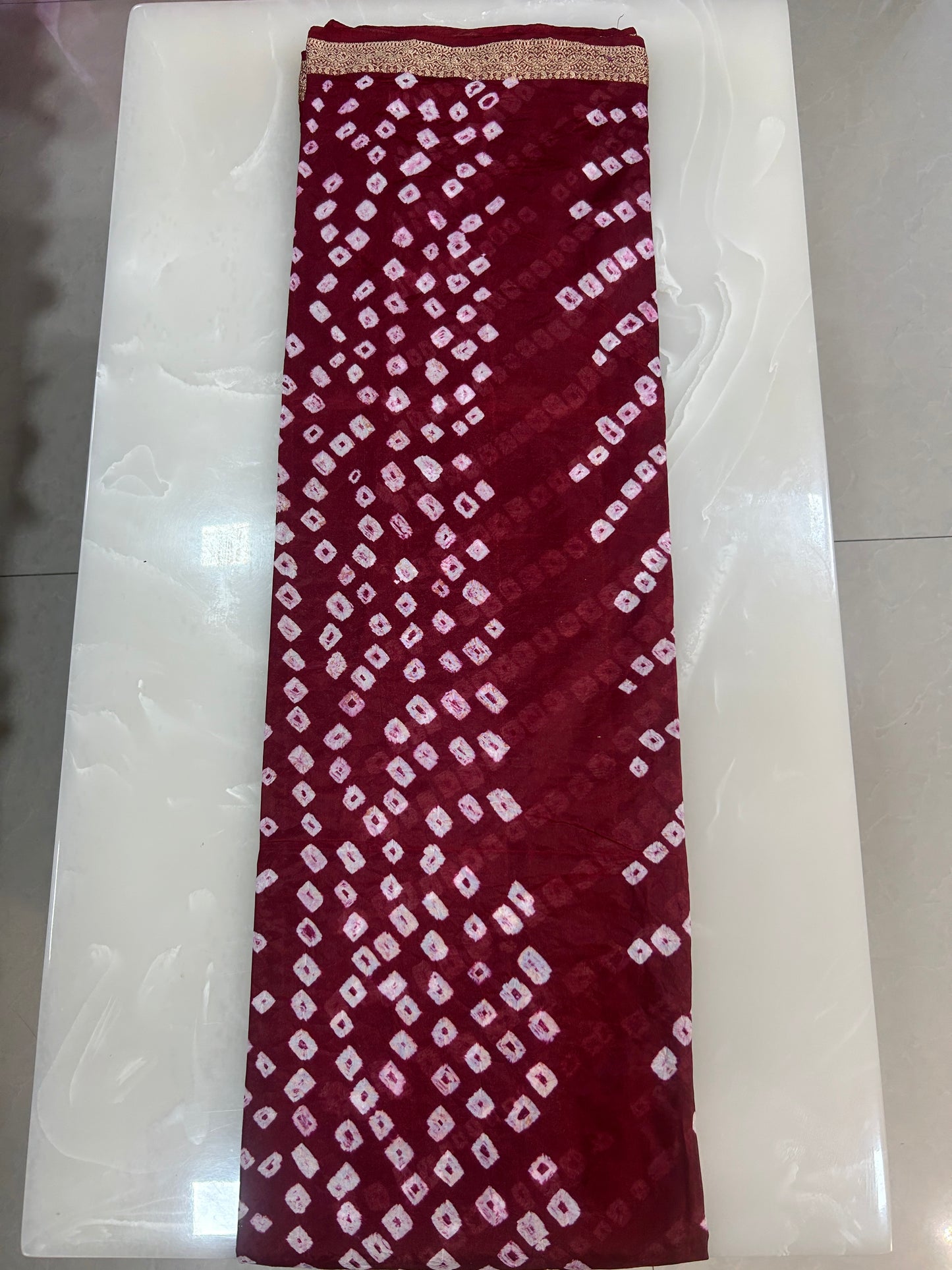 Maroon Bandhani Saree with Lehariya pattern and  Zari Border SB191