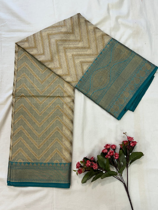 Champagne Gold with Teal Blue border with Antique Gold Zari Linen Tissue Banarasi saree with Brocade blouse piece