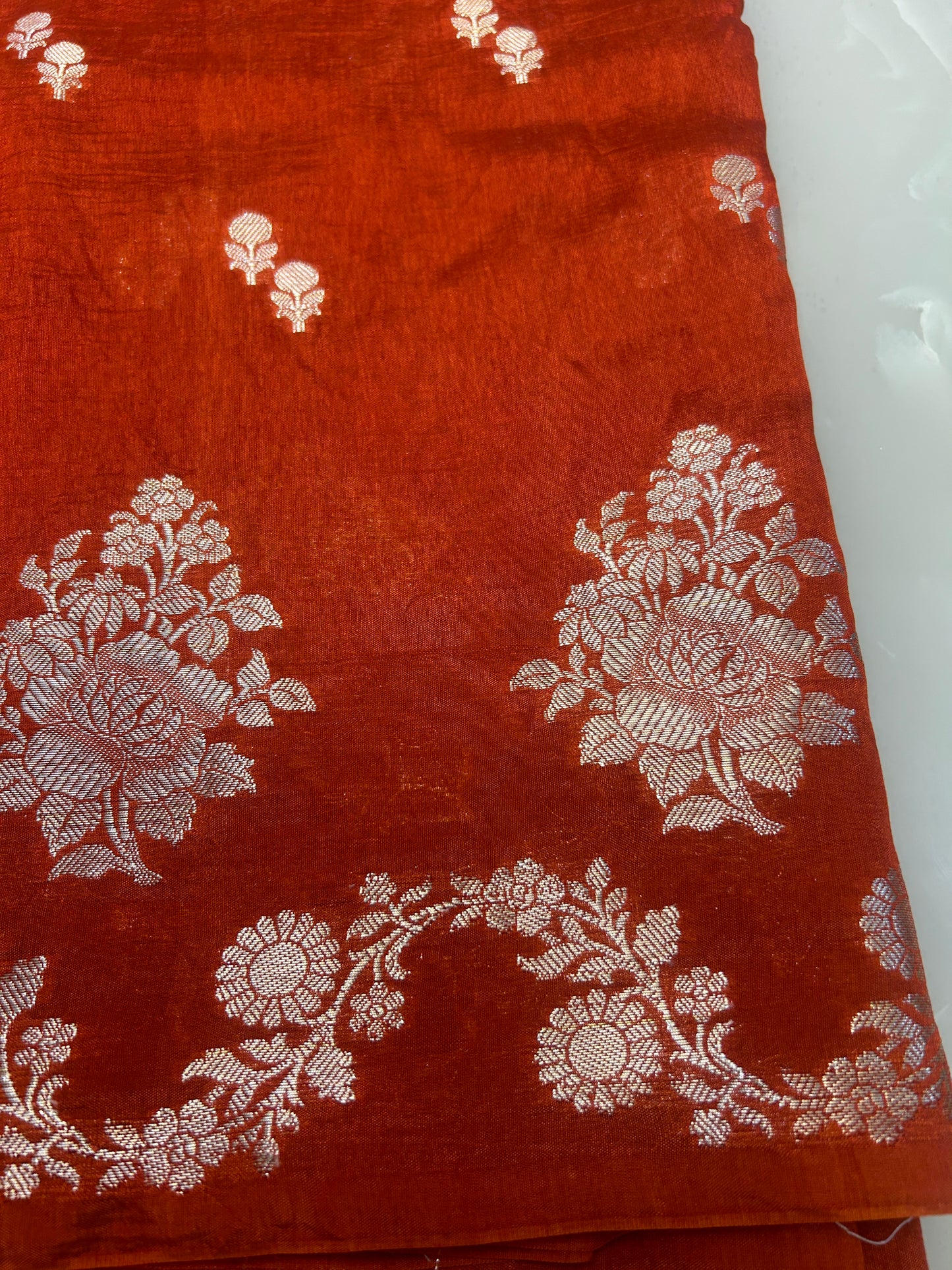 Rust Orange color boarderless  Dupion Silk Handloom Banarasi Saree