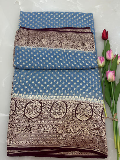 Powder blue Handloom Khaddi Georgette Banarasi Saree with contrast brown blouse