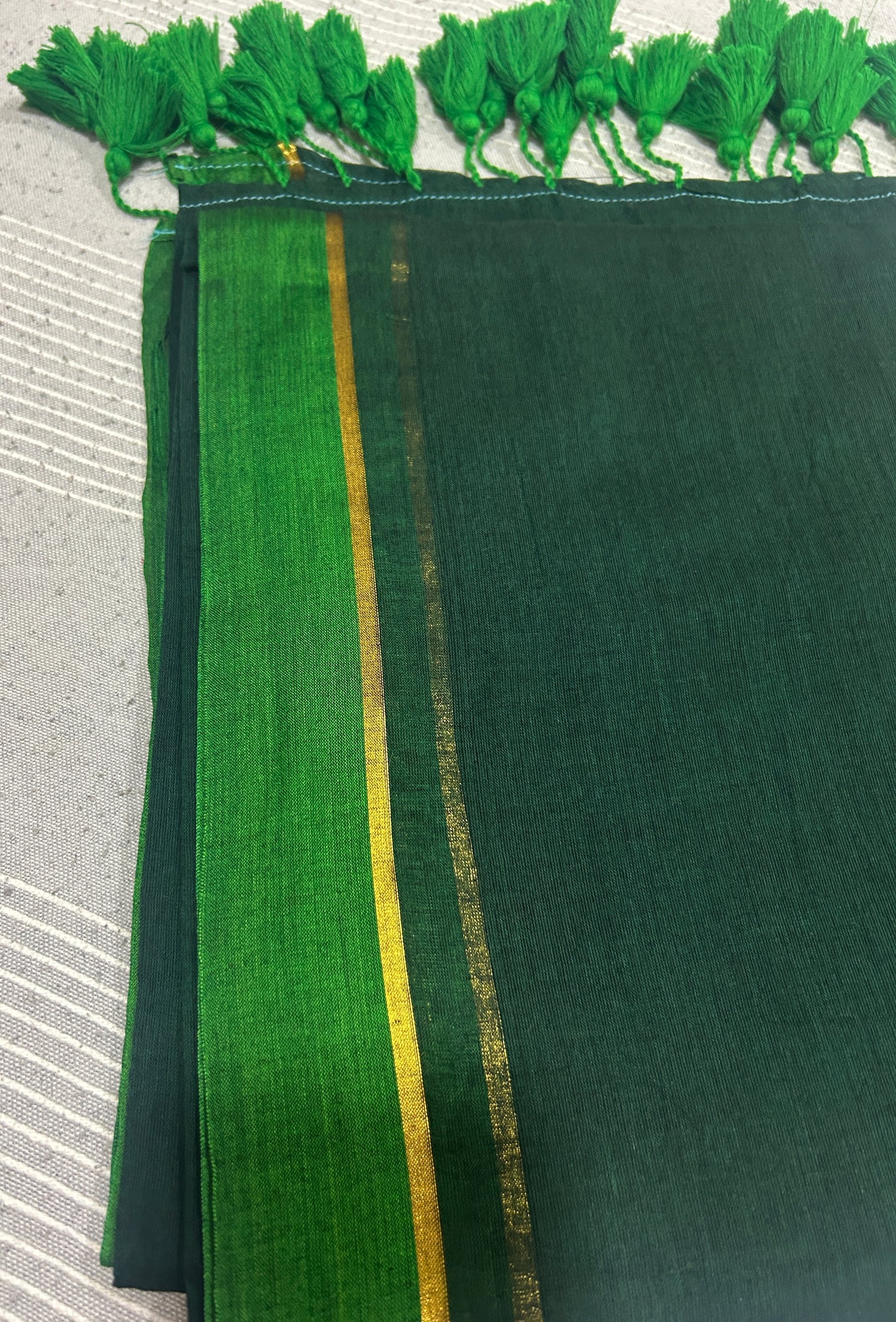Dark Green Mulcotton saree with light green and  golden stripe  SMC248