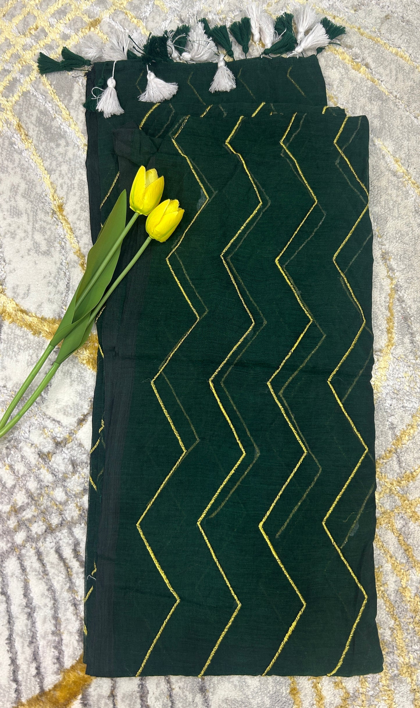 Bottle green Mulcotton saree with zig zag golden thread embroidery