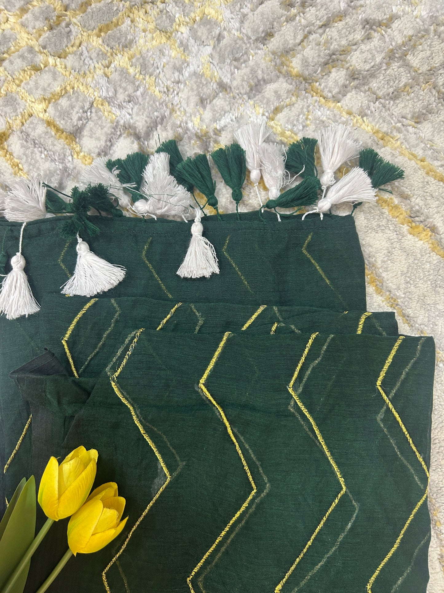 Bottle green Mulcotton saree with zig zag golden thread embroidery