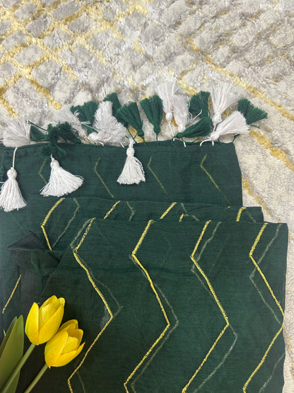 Bottle green Mulcotton saree with zig zag golden thread embroidery